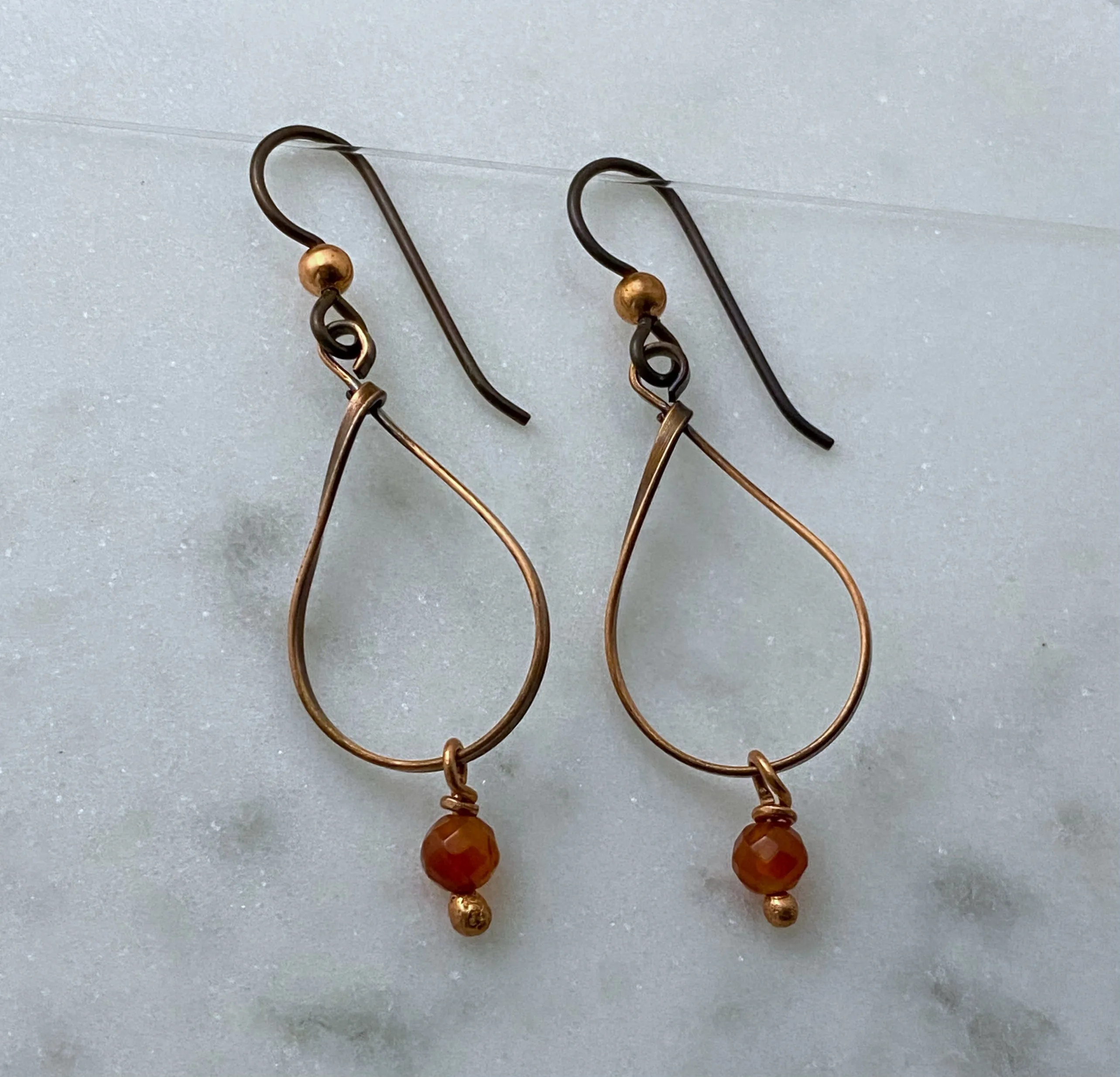 Copper teardrop earrings with carnelian