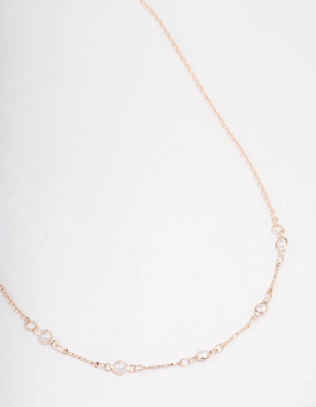 Rose Gold Encased Pearl Station Short Necklace