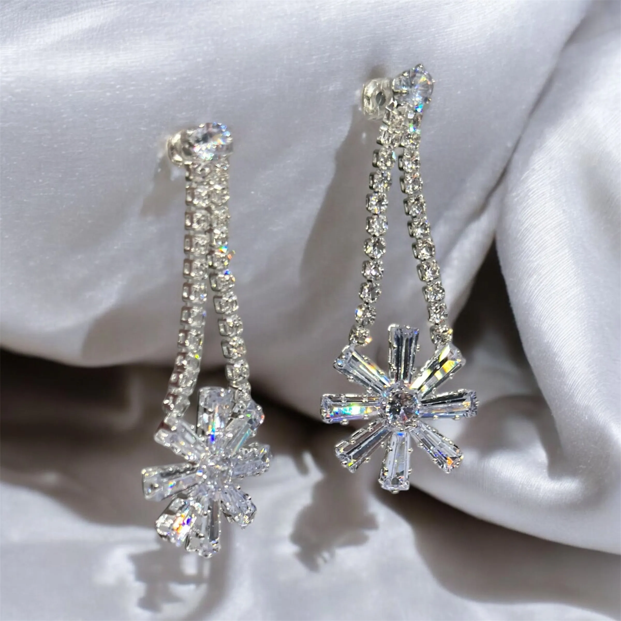 Silver stars diamante dangle earrings | Celestial snowflakes drop earrings | swing Christmas earrings